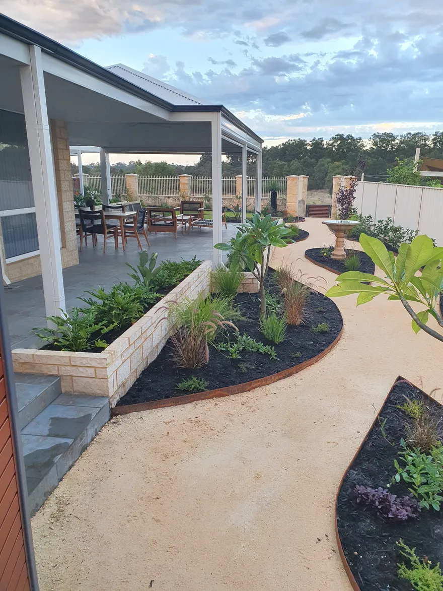 Backyard in Viveash transformed with fresh turf and new garden beds by Perth Landscaping Renovations